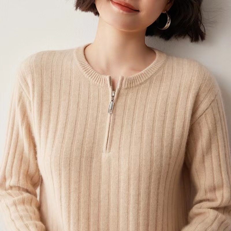 Knitted demi-season sweater with zipper with a round collar