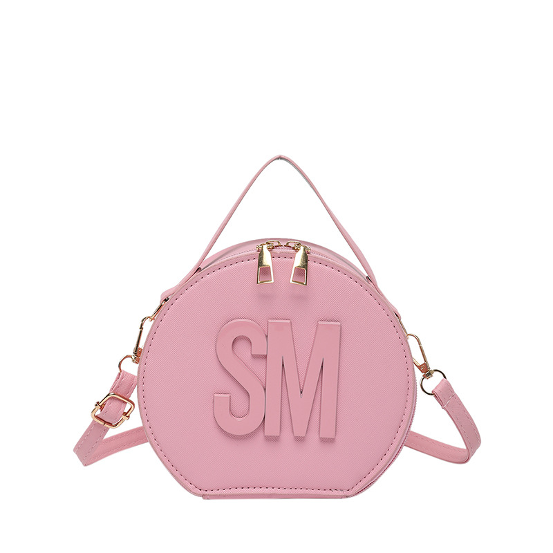 2025 primavera nueva impresión de letras de moda redondas personalidad simple nicho ocio mochila de tendencia de mujer viaje