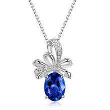 蝴蝶结形吊坠仿级天然坦桑石项链 镀18K白金缠绕丝带钻石吊坠女