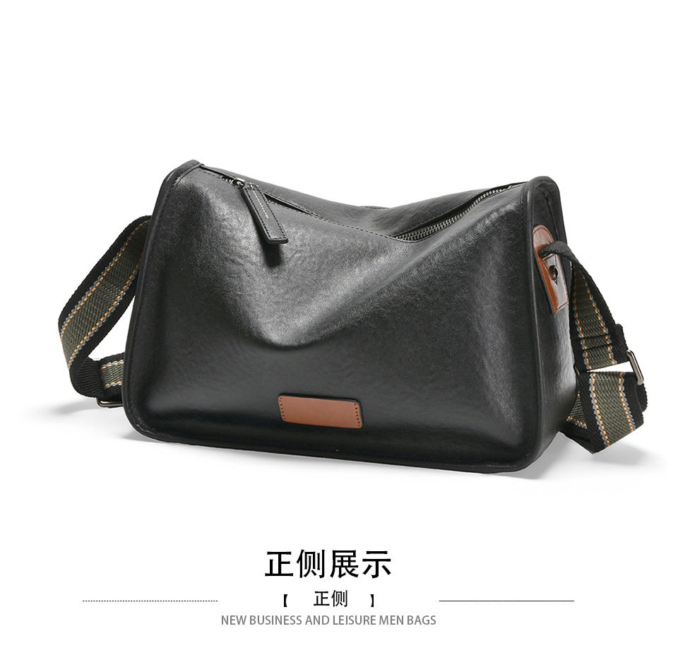 Túi đeo chéo nam da bò kiểu retro 29×11×17 cm — Màu đen da thực vật, Da cầm tay màu đen chi tiết 32