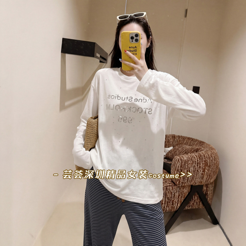 Shenzhen Nanyou Ac Rhinestone Letter Cotton-Linen Long-Sleeve T-Shirt for Women, Early Spring 2026 New Style, Loose and Versatile Design Top Shenzhen Nanyou Ac Rhinestone Letter Cotton-Linen Long-Sleeve T-Shirt for Women, Early Spring 2026 New Style, Loose and Versatile Design Top
