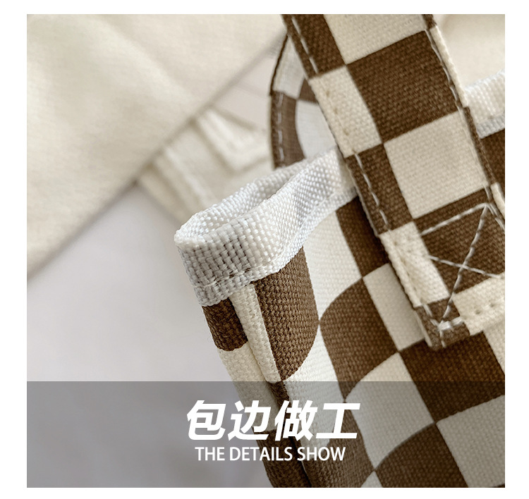 A fashionable new Japanese and Korean chic black and white checkered canvas bag, a large-capacity single-shoulder bag for women, and a simple student handbag Item Picture