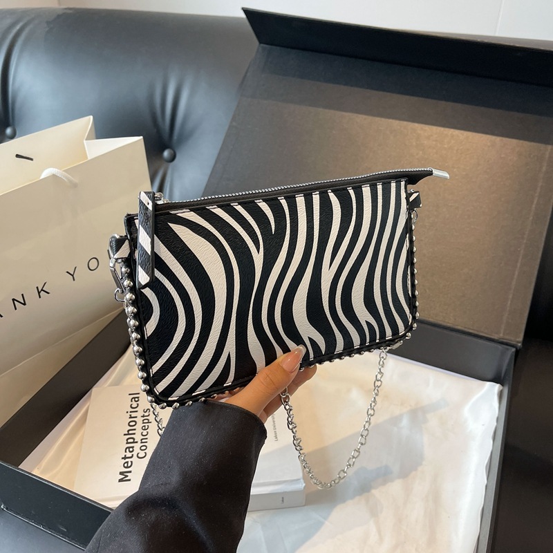 Bolso bandolera nuevo transfronterizo versátil y casual, para la axila, bolso de mujer simple con estilo occidental, diseño de nicho, bolso de cadena, bolso de mano de moda