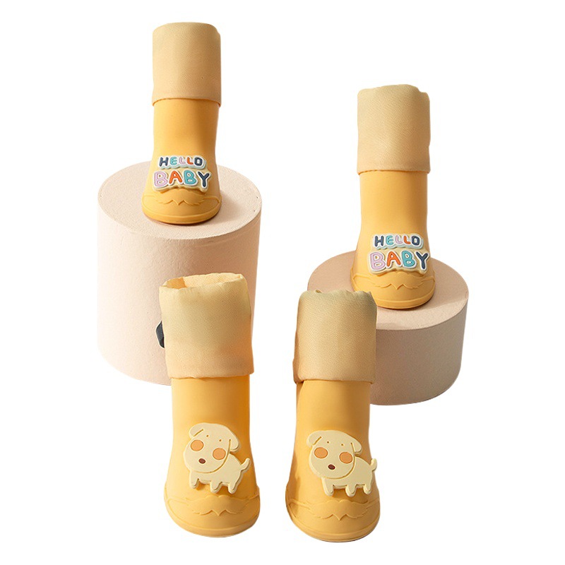 Botas de lluvia de silicona para mascotas de dibujos animados transfronterizos de alta calidad perro pequeño fuera antideslizante resistente al desgaste zapatos de perro impermeables cubierta de pie de peluche