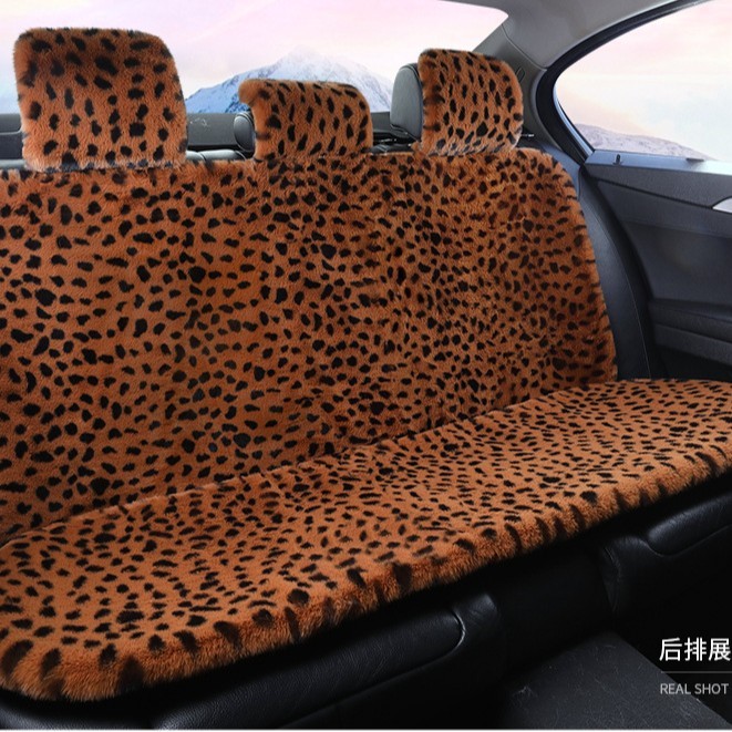 新しい冬のぬいぐるみの車のクッションネットの赤いヒョウの紋様のぬいぐるみの5つの共通のシートの快適な保温のクッション|undefined