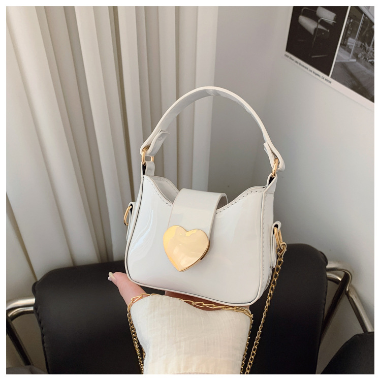 Unisex Pu Heart Shape Solid Color Elegant Streetwear Sewing Thread Square Hidden Buckle Shoulder Bag display picture 17