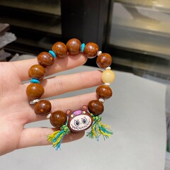 太阳子菩提根籽手串搭配檀木可爱拉布布手串流苏文玩手链
