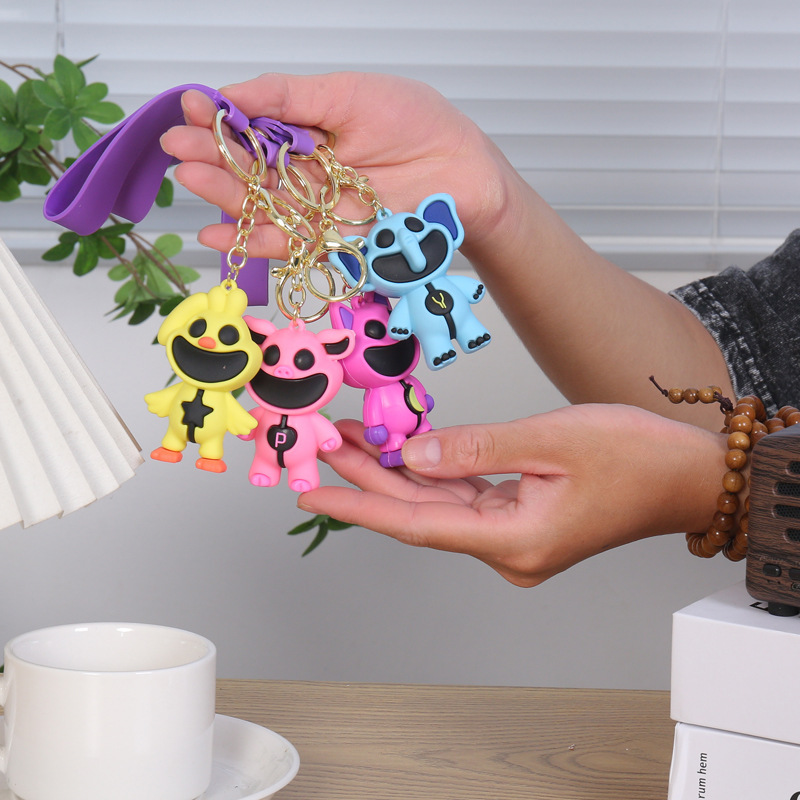 PVC soft glue cross-border smiling Bobby cute cartoon key chain pendant car key chain gift wholesale