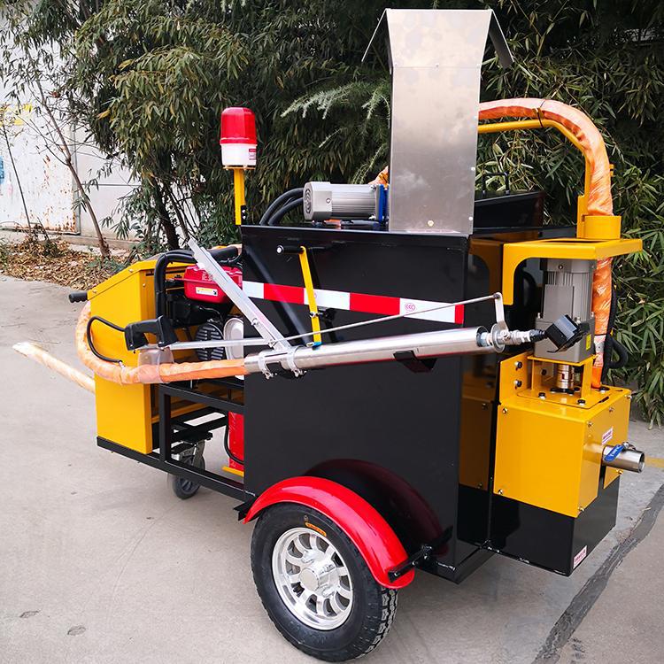 Máquina de reparación de grietas de suelo especial para carreteras municipales, máquina de vertido de asfalto empujada a mano, dispositivo de reparación de costura de ahorro de material a temperatura constante