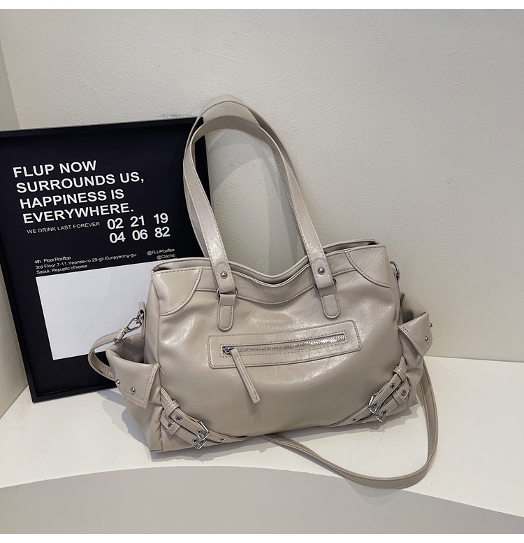 Bolso retro de gran capacidad para mujer 2025 verano nuevo estilo coreano oscuro ventilador bolso de coche casual mensajero de viaje bolso especial
