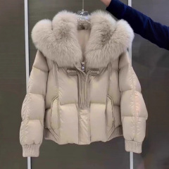 女性用卸売デザインファッショナブルで高級感のあるフード付きコットンジャケット、冬スタイルのファー付きアプリコットカラーのネットセレブコットンジャケット
