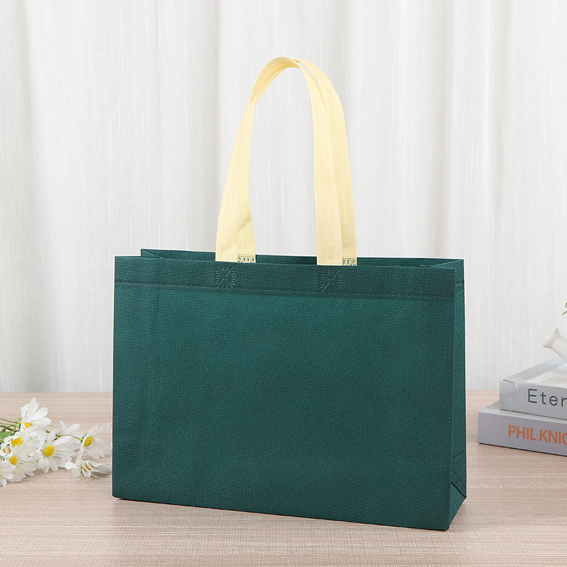 Bolsas de tela no tejida tiendas de souvenirs de viajes de madres y bebés en línea bolsa de compras de mano engrosada bolsa de mano image 6