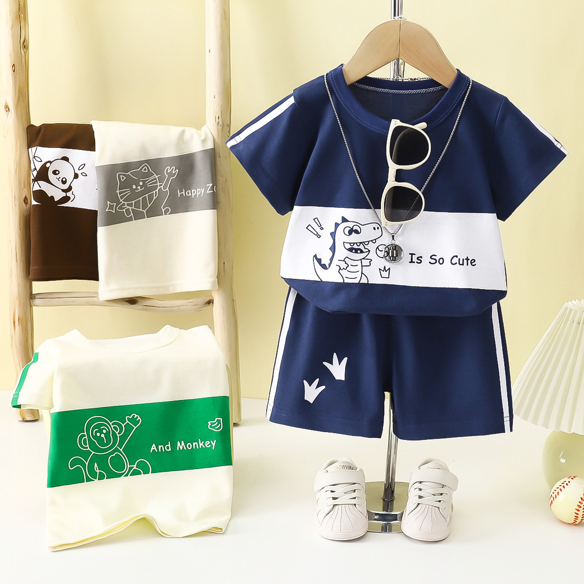 Verano para niños nuevo estilo traje de manga corta camiseta a rayas para niñas y niños ropa de bebé suelta y transpirable al por mayor