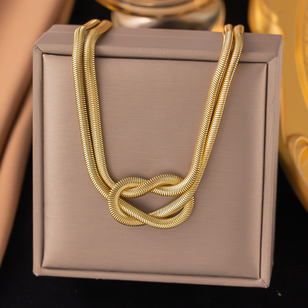 38【h378】knotted snake bone chain necklace gold