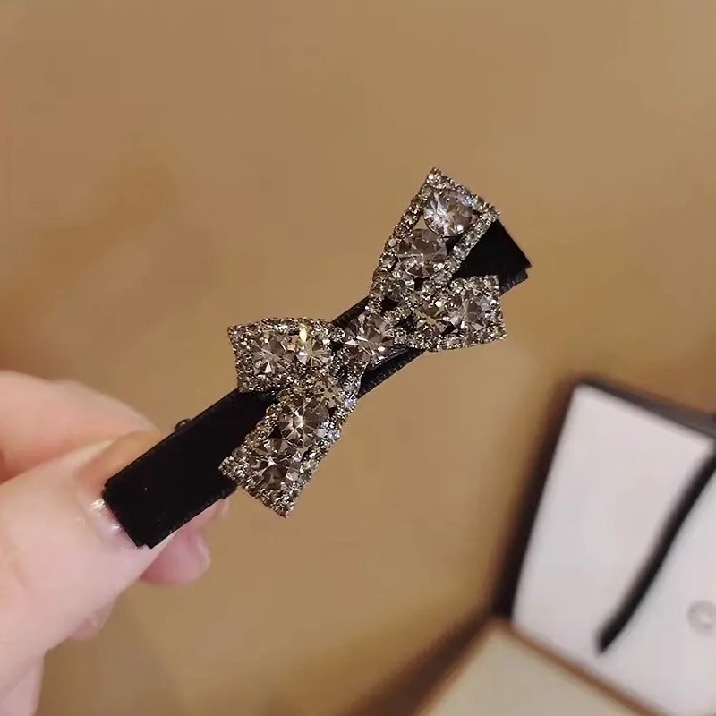 Clips de pelo de corbata de diamante ligero lujoso viento versátil arco de diamante clip de boca de pato de seda de mar clips de borde simple adornamiento para el pelo