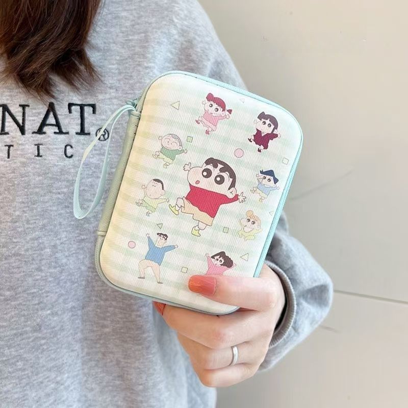Suitable for Apple, Huawei, Xiaomi, OPPO, and Samsung mobile phone bags with cartoon characters, including Cinnamon Dog, Hello Kitty, and Samsung models. Features a lanyard for a sturdy, portable storage bag.