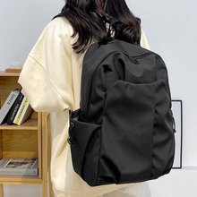 简约潮流书包2024大容量学生Backpack韩版男女纯色跨境旅行双肩包