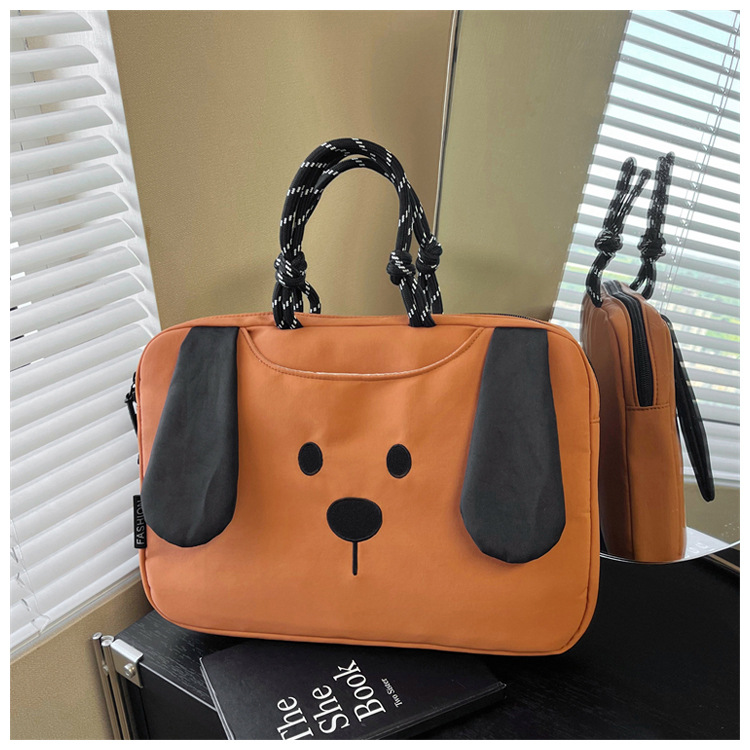 Portable, fleece-lined, shockproof laptop bag with a cartoon design, featuring colorful painted leather and a waterproof storage compartment
