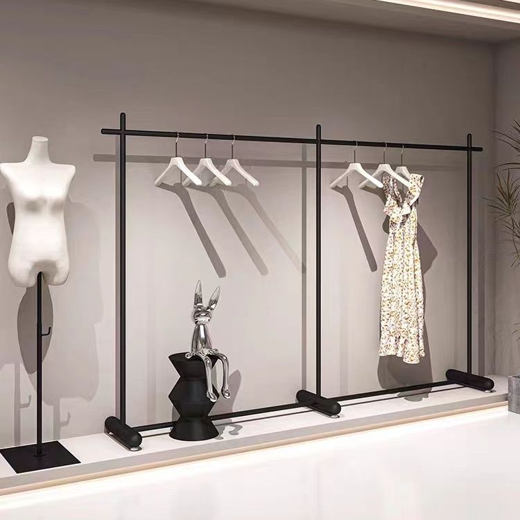 Tienda de ropa negro negro negro de hierro forjado estante de exhibición red centro comercial estante de exhibición de ropa de mujer estante de isla colgando tipo colgante de suelo