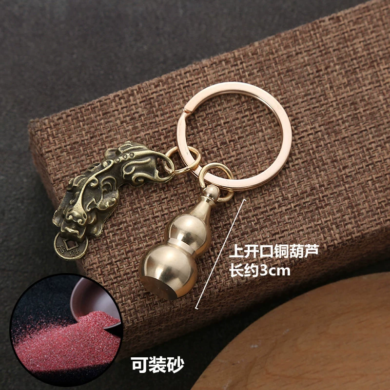 Оптовая продажа ювелирных изделий: брелок-подвеска из циннабарной меди в форме круглой полой тыквы с изображением Пиксиу, привлекающего удачу, из Иу.