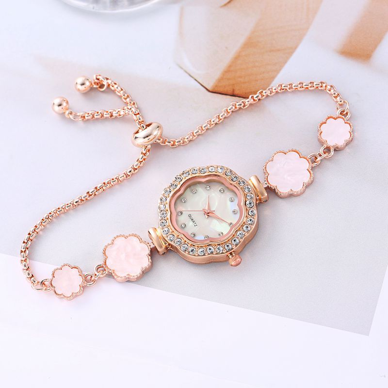 Reloj estudiante femenina transfronteriza Girasol Diamante ins estilo universitario elegante pequeño dial decoración pulsera perezosa