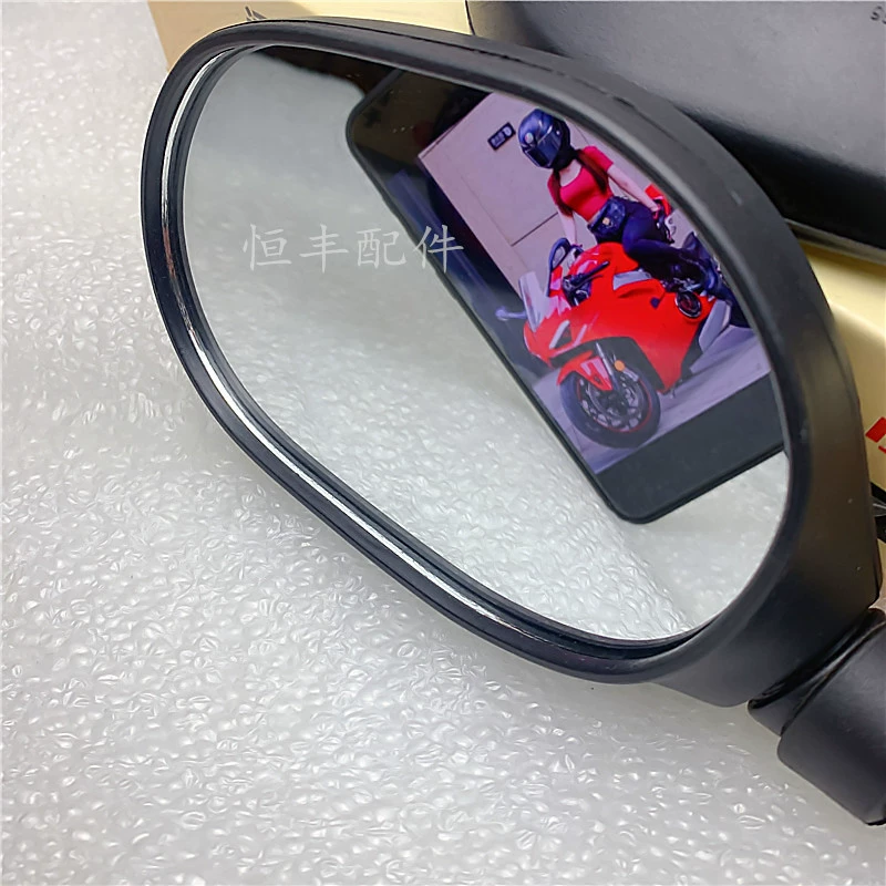 Electric car, retroreflective rear view mirror
