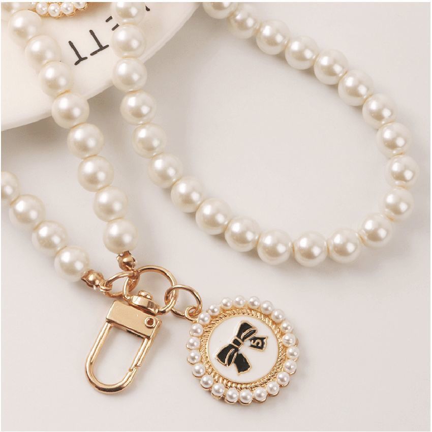 Cadena de perlas caja de teléfono móvil pequeña cadena de viento de fragancia nueva pulsera corta muñeca delicada colgante de mujer portátil