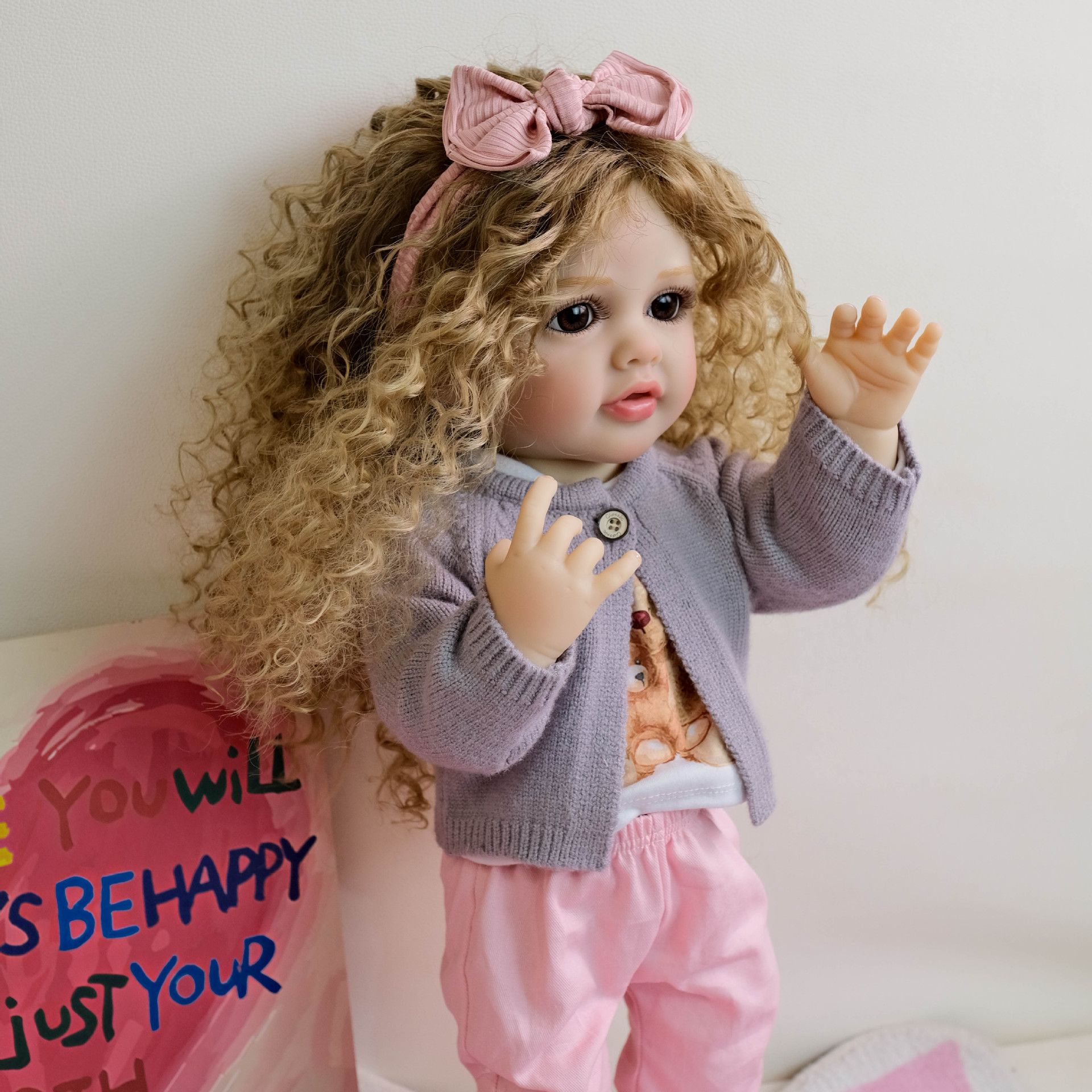 NPK22inch chaqueta de punto de manga larga morada fresca de goma completa Betty simulación renacimiento muñeca acompañante niño regalo