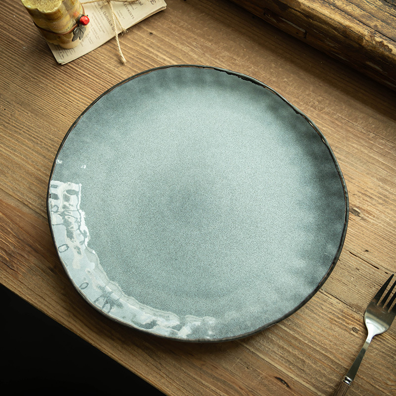 Plato de cerámica retro creativo plato irregular platos de platos caseros cubiertos de filete platos de nicho platos al por mayor