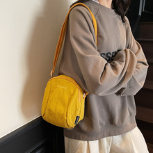 韩系百搭小包包斜挎包女2025新款休闲帆布包轻便通勤布包男手机包