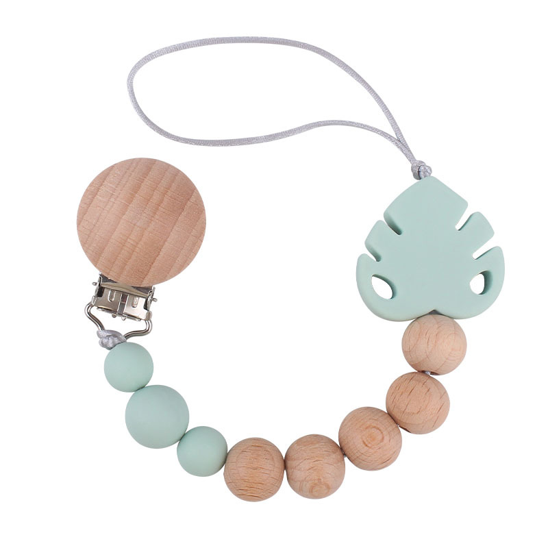 Suministros para bebés creativo haya chupete clip molar juguete mordedor bebé hoja de silicona chupete cadena anti-caída de la cadena