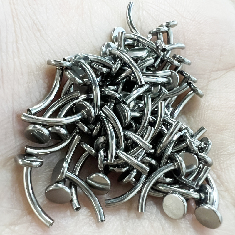 Silver pointed spike labret stud material detail