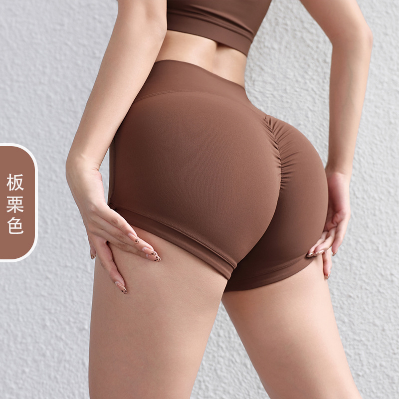 Pantalones desnudos de mel桃, pantalones cortos de yoga, pantalones de fitness ajustados, pantalones cortos deportivos para correr.