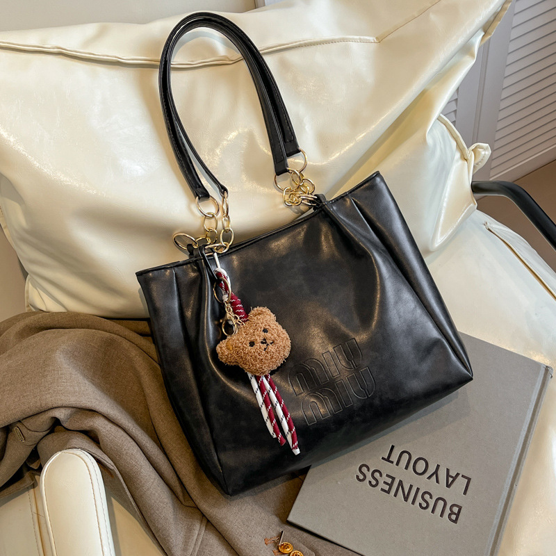 Bolsa de moda retro para estudiantes universitarios, bolsas de brazo para viajar en la primavera 2025, bolsas de ocio de nicho para mujeres.