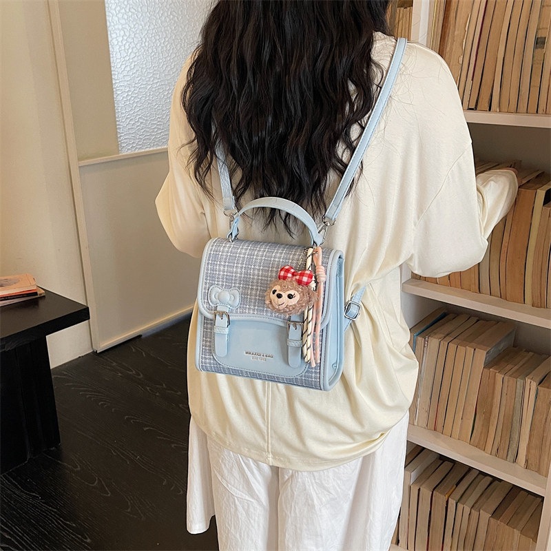 Mochila universitaria popular para estudiantes mochila casual de mujer estilo a cuadrícula nicho 2026 escuela de moda de verano nuevo estilo