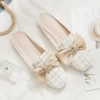 With bow, Chanel style