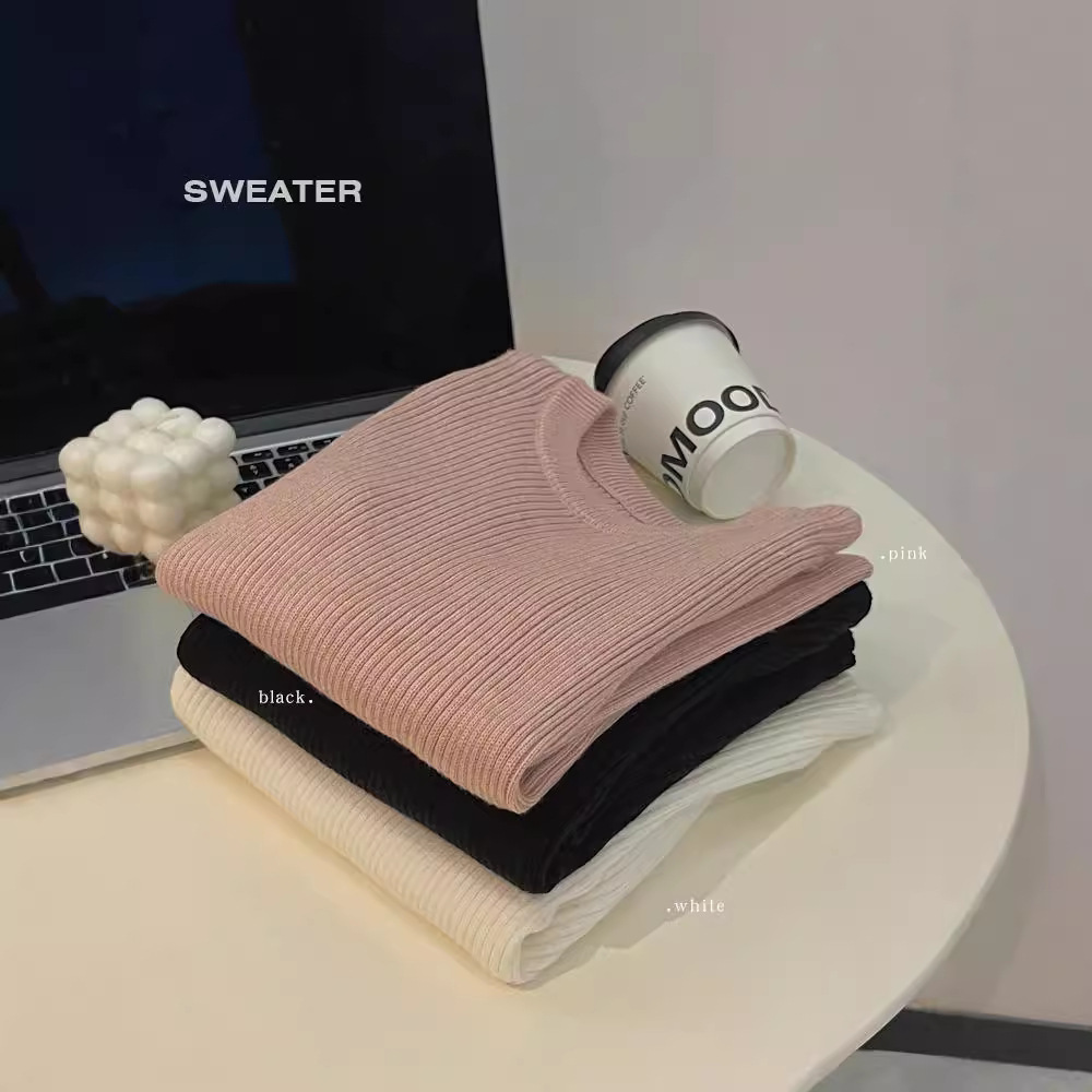 Niñas otoño y invierno nuevo estilo de tela de polilla de polilla de núcleo de hilo inferior con suéter para niños camisa de punto universal