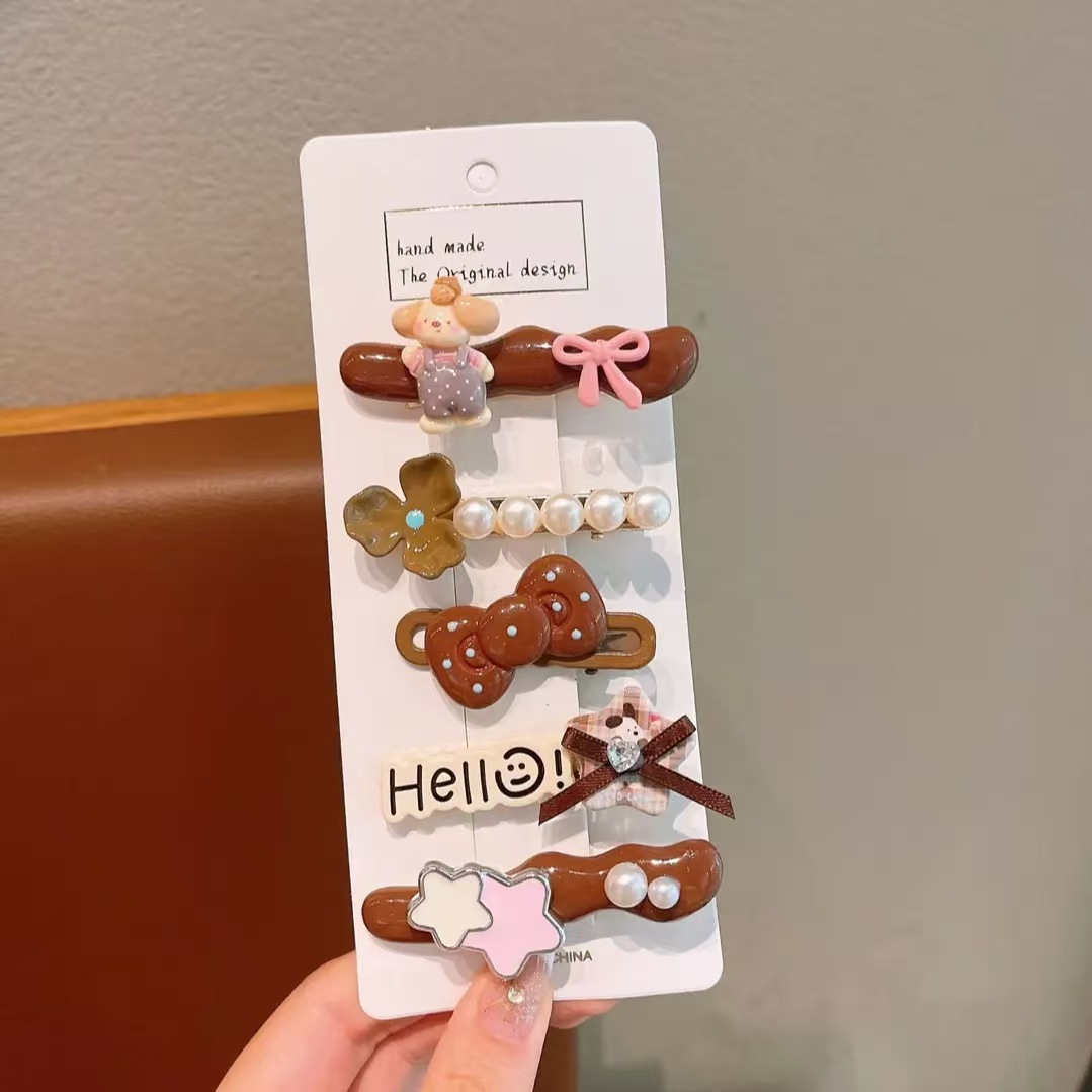 Otoño y invierno lindos osos peluche clip para el cabello lateral de las mujeres clip para el cabello de niños 2025 nuevo clip para el borde de la cabeza