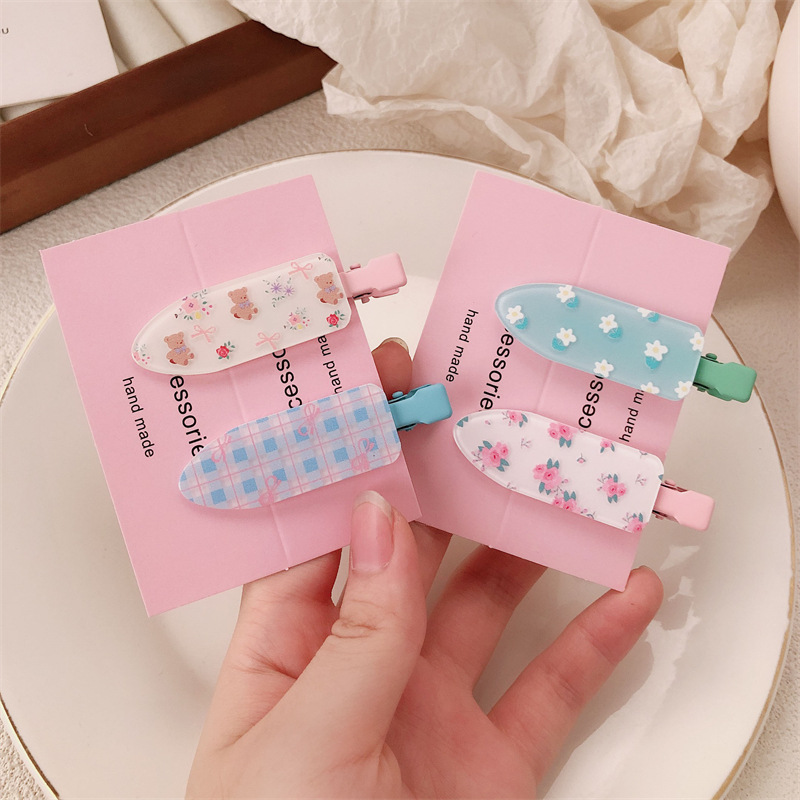 Un par de impresión de arco para niñas pinzas de cabello sin marcas de dibujos animados para mujeres adorables pinzas de cabello para el cabello de bordas rotas