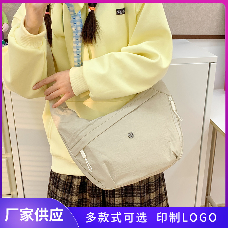 便携简约饺子包女2025新款百搭运动骑行小包日常通勤单肩斜挎包