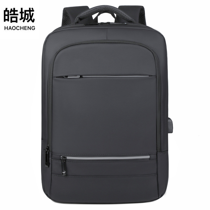 Mochila recargable USB de negocios para hombres transfronterizos Bolso de computadora multifuncional de viaje de ocio de gran capacidad al por mayor