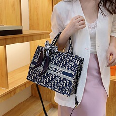 クロスボーダー高級軽豪華大容量刺繍ハンドバッグ2025新商品外出百合女性バッグサラリーマン通