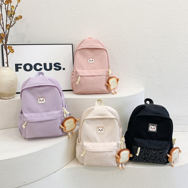Jardín de infantes bolsas escolares de dibujos animados lindas bolsas de hombro de color sólido para niños y niñas nuevas bolsas de niños de gran capacidad