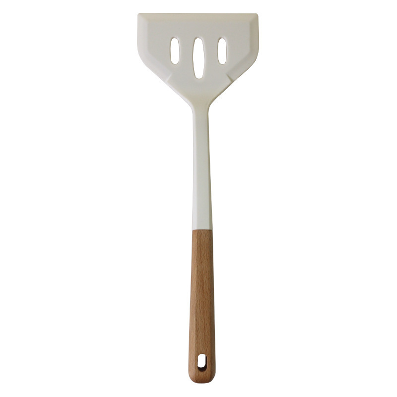 Cuchara de sopa de espátula de silicona transfronteriza Juego de 13 piezas de sartén antiadherente Pala de silicona de grado alimenticio Juego de utensilios de cocina de silicona blanca lechosa al por mayor