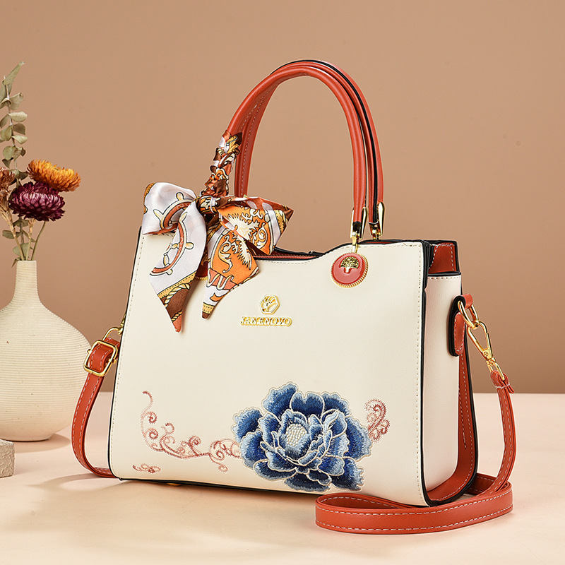 Bolsa de mano de mujer elegante regalo 2025 nuevo estilo para la suegra flores bordadas de moda bolso de hombro