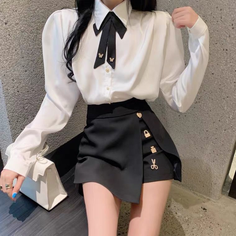 GraceChic Frühlingsoutfit: Zweiteiliges Set aus Bluse mit Schleife, Puffärmeln und hochtailliertem, schwarzem Rock mit Schlitz_voghion.com