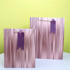 Cross-border export gift bag with gold foil hanging tag, white card hand-held paper bag, wholesaler and supermarket retailer packaging gift bag