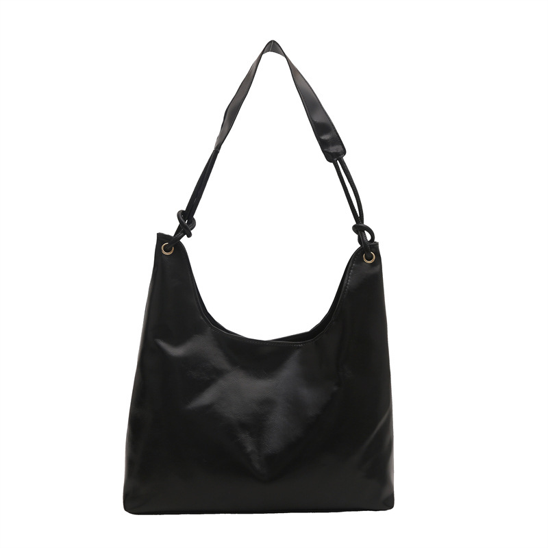 Bolso de brazo retro para mujeres 2025 primavera nueva moda hollow coreana bolso especial de gran capacidad empalmado bolso de hombro