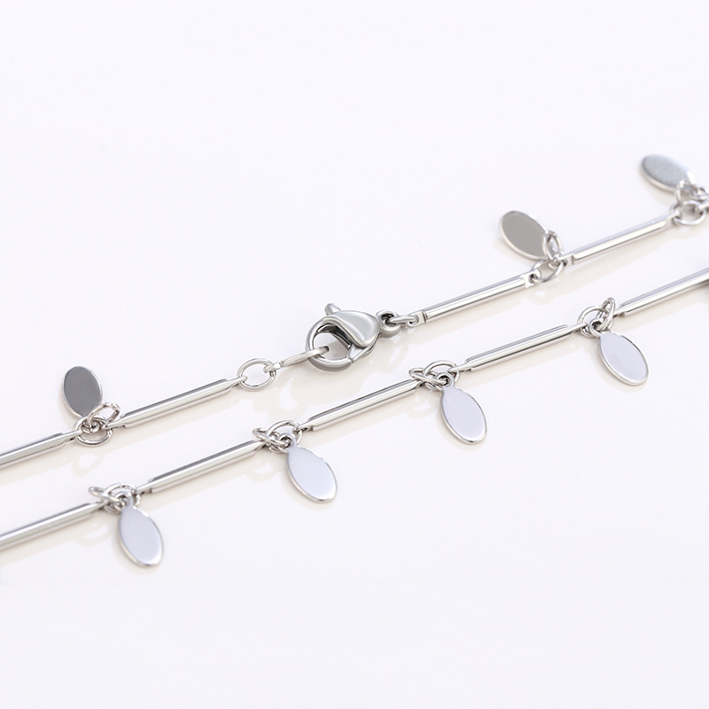 Joyería de Xuking Comercio exterior europeo y americano personalidad transfronteriza moda pie joyería borla lentejuelas blanco tobillera hembra al por mayor