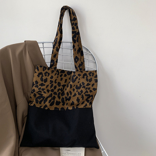 Autumn and winter new leopard print canvas bag women's single shoulder large capacity literary design ins tote bag student class bag